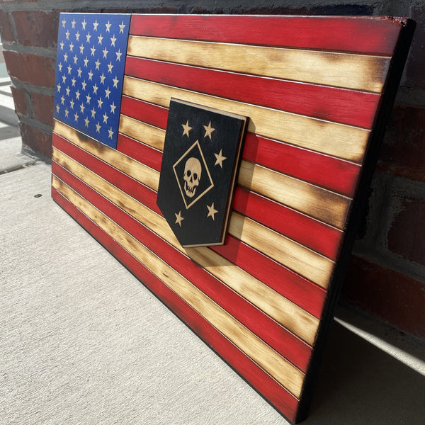 twenty four inch red white and blue american flag with laser cut marine raiders patch, laser engraving, and laser cut stars right angle view