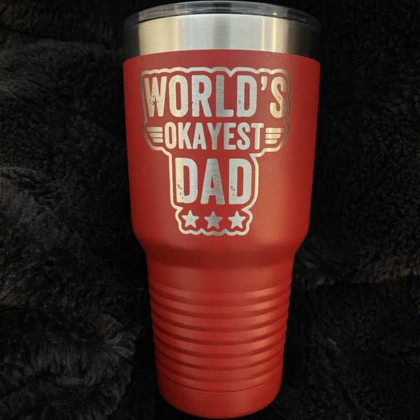 Red insulated tumbler with world's greatest dad logo laser engraved on it