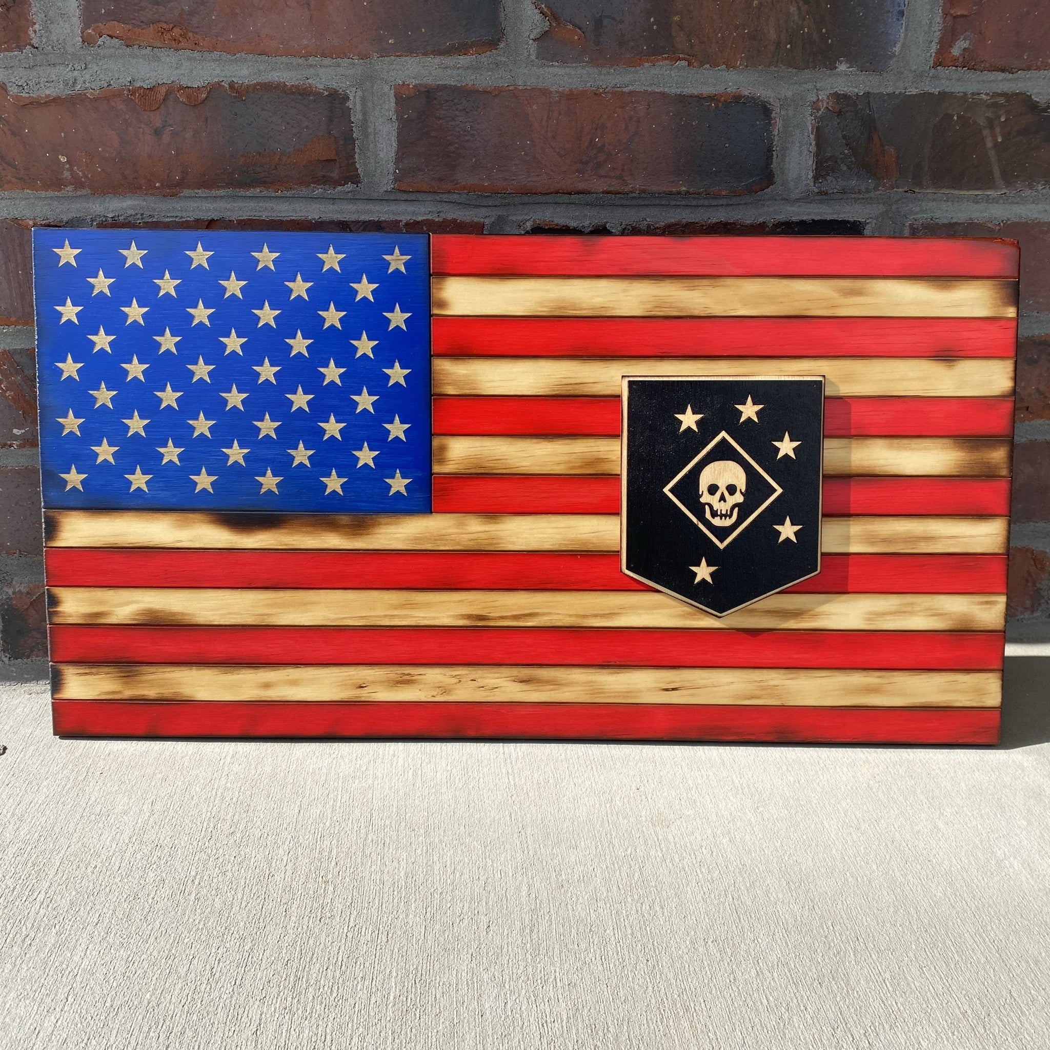 twenty four inch red white and blue american flag with laser cut marine raiders patch, laser engraving, and laser cut stars