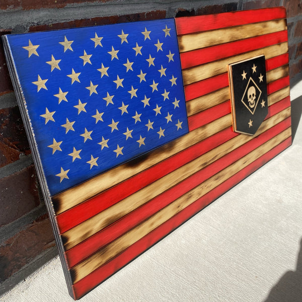 twenty four inch red white and blue american flag with laser cut marine raiders patch, laser engraving, and laser cut stars left angle view