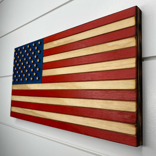 fourteen inch red white and blue american flag with laser engraving and laser cut stars right angle view